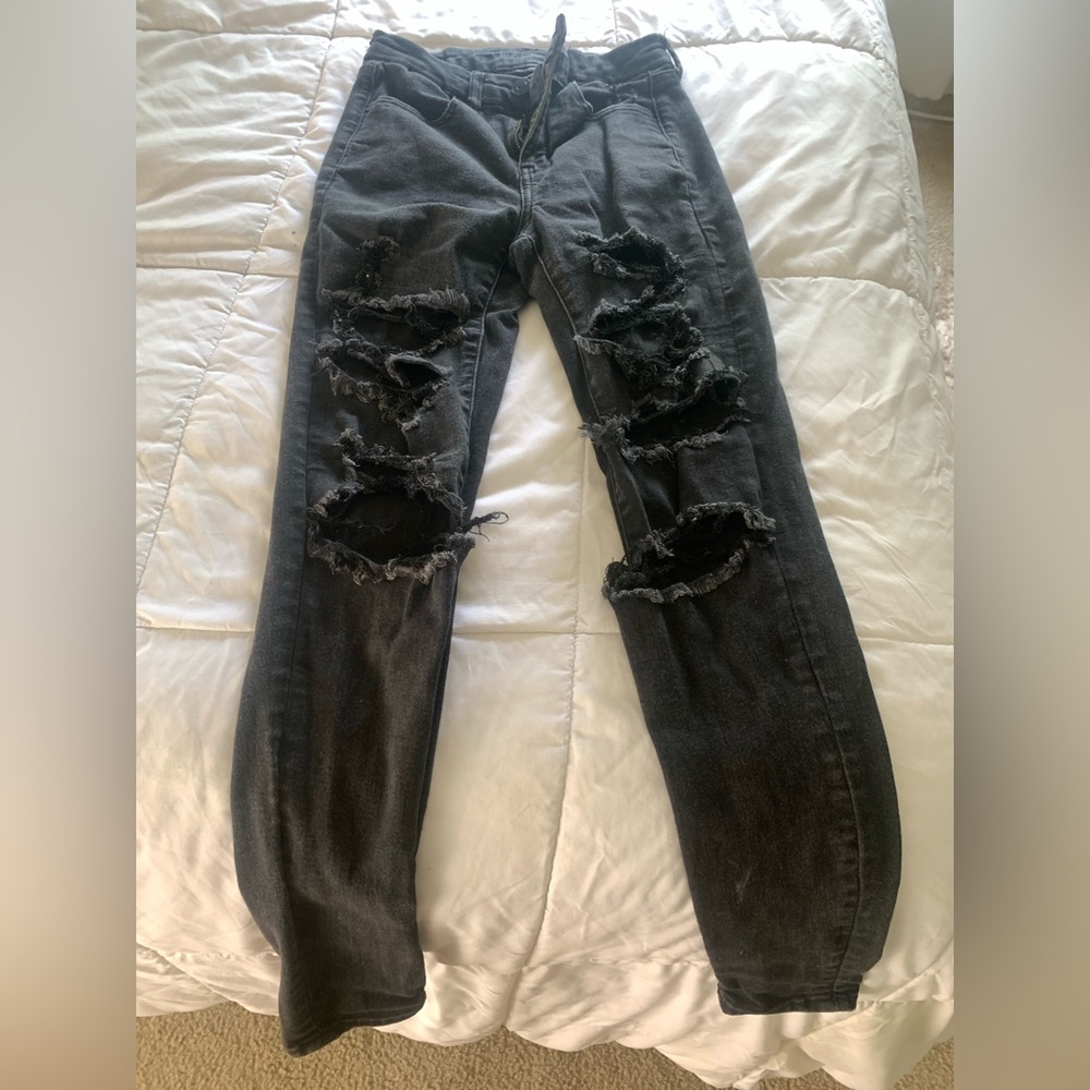 black ripped jeans